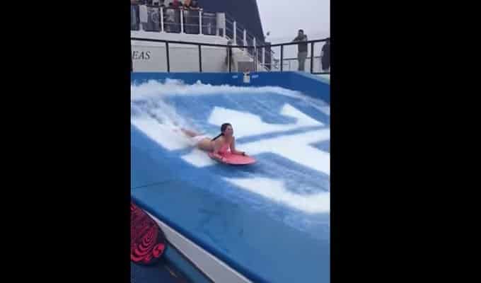 She seems to be enjoying her surfing lessons