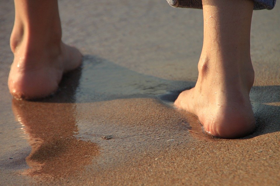 Walking barefoot on beaches is one way of gettng infected by the hookworm larvae.